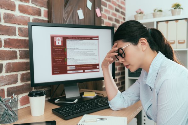 Unhappy women at computer